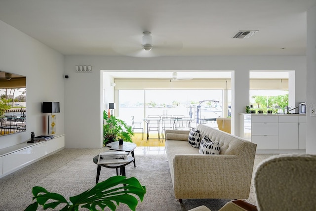 440 64th Ave, St Pete Beach, FL 33706 - living area featuring a ceiling fan