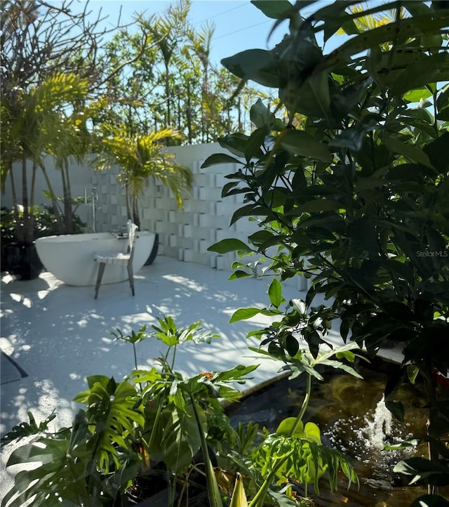 440 64th Ave, St Pete Beach, FL 33706 - view of patio / terrace with fence