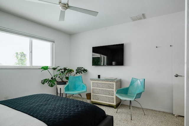 440 64th Ave, St Pete Beach, FL 33706 - bedroom featuring speckle patterned floor, baseboards, and a ceiling fan