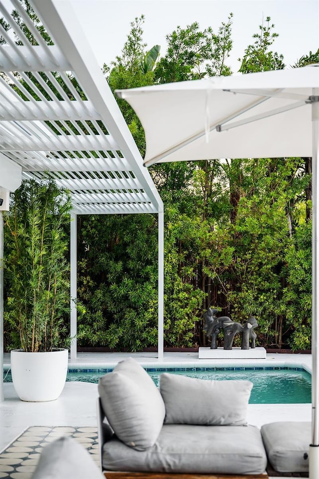440 64th Ave, St Pete Beach, FL 33706 - outdoor pool featuring a pergola