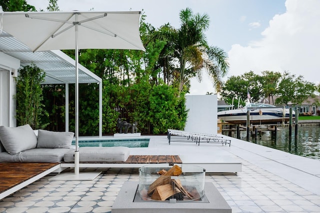 440 64th Ave, St Pete Beach, FL 33706 - exterior space featuring an outdoor pool, a patio area, boat lift, and a water view
