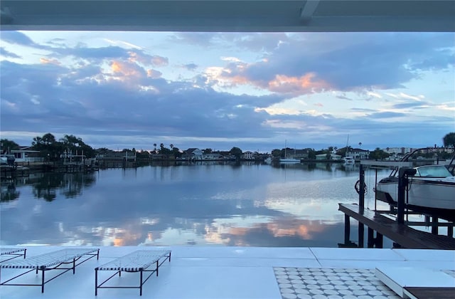 440 64th Ave, St Pete Beach, FL 33706 - dock with a water view and boat lift