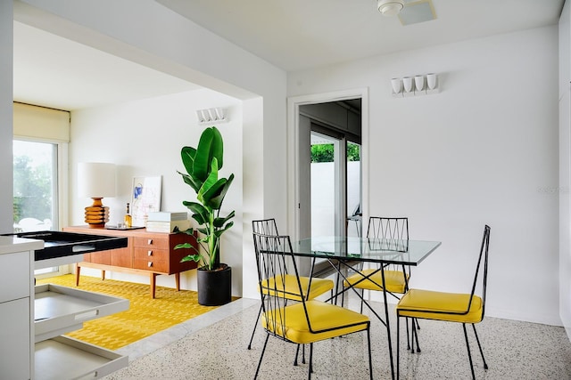 440 64th Ave, St Pete Beach, FL 33706 - dining room featuring speckle patterned floor