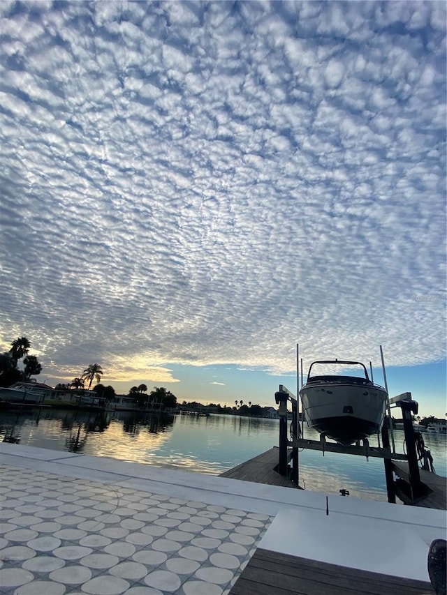440 64th Ave, St Pete Beach, FL 33706 - water view featuring boat lift and a dock