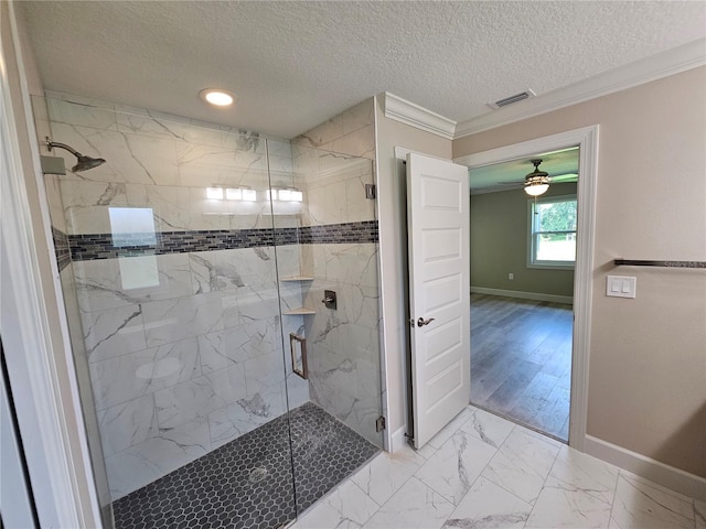 full bath with marble finish floor, baseboards, visible vents, and ornamental molding