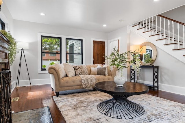 living room with dark hardwood / wood-style floors