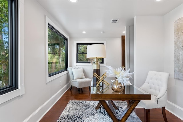 sitting room with dark hardwood / wood-style floors