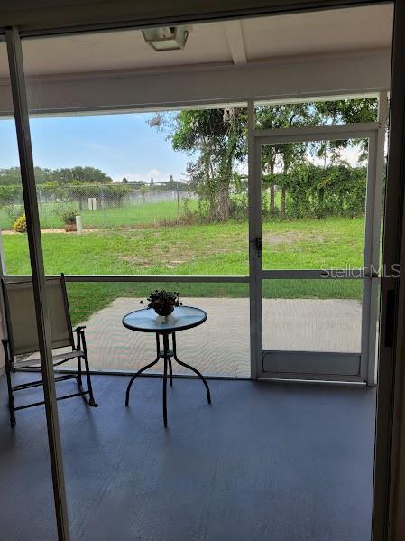 unfurnished sunroom featuring a wealth of natural light