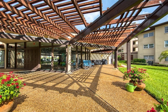 view of patio featuring a pergola and central AC