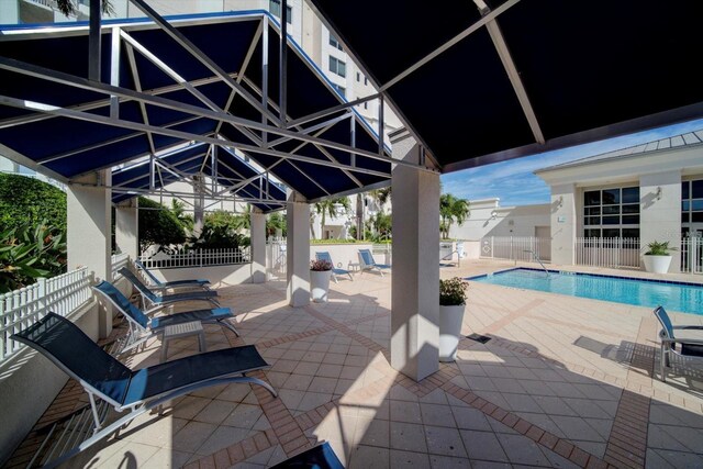 view of patio featuring a community pool