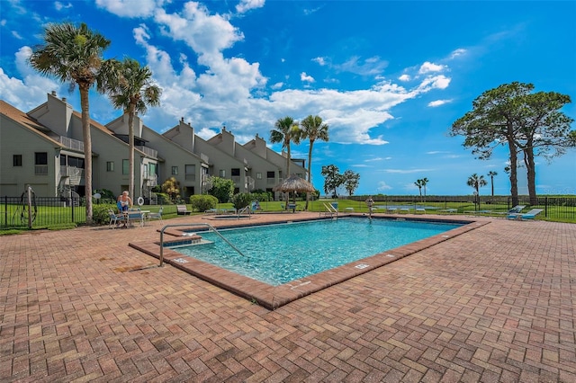 view of pool featuring a patio