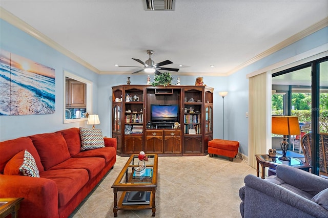 living room with ceiling fan and ornamental molding