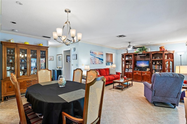 dining room featuring ceiling fan with notable chandelier, light tile patterned floors, and crown molding