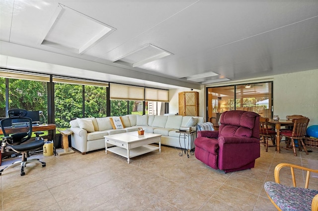 living room with light tile patterned floors