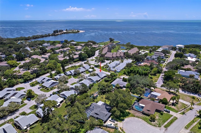 birds eye view of property with a residential view and a water view