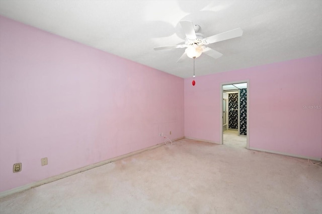 spare room with ceiling fan