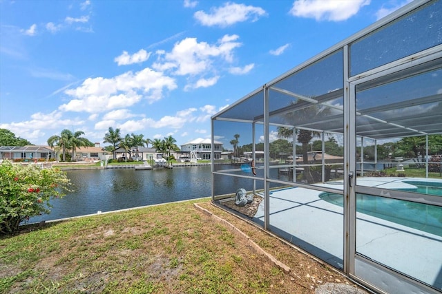 view of dock featuring a lanai and a water view