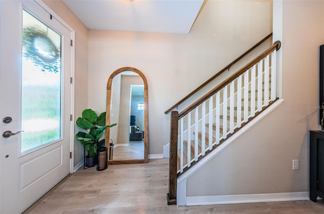 foyer with light hardwood / wood-style flooring