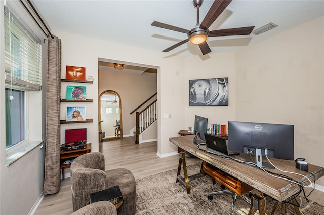 office featuring light hardwood / wood-style flooring and ceiling fan