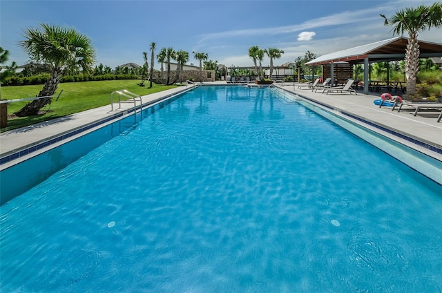 view of swimming pool with a gazebo, a yard, and a patio