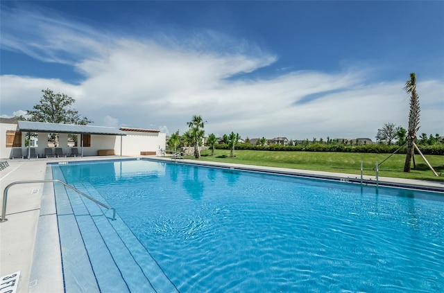 view of pool featuring a patio