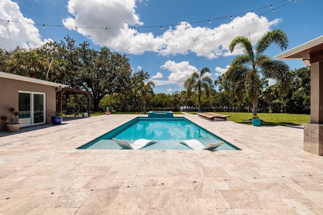 view of pool with a patio area and an in ground hot tub