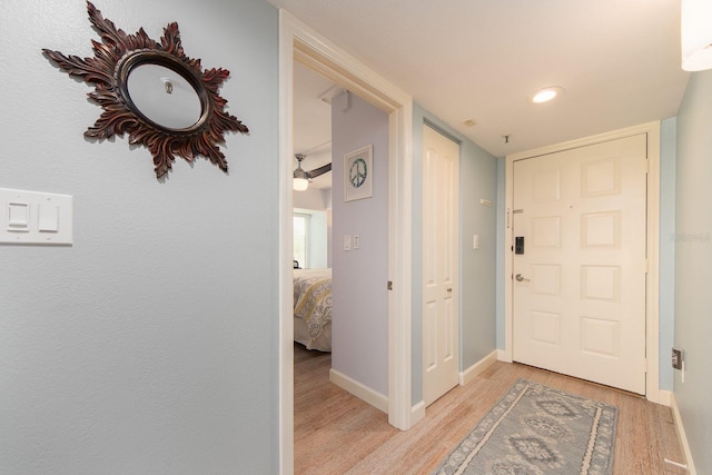 entryway with light hardwood / wood-style floors