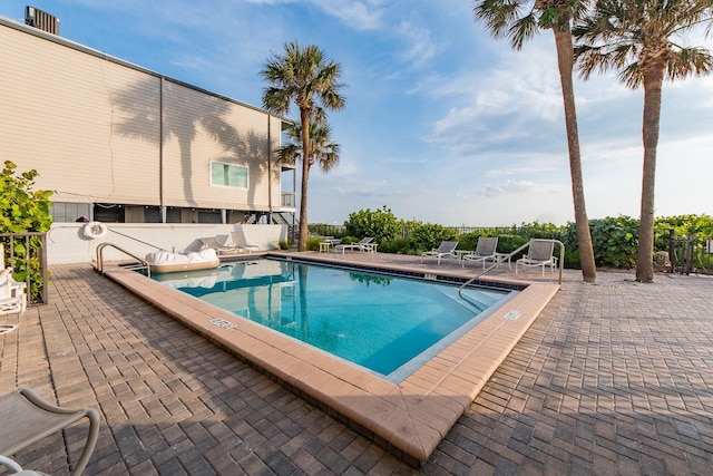 view of pool with a patio area