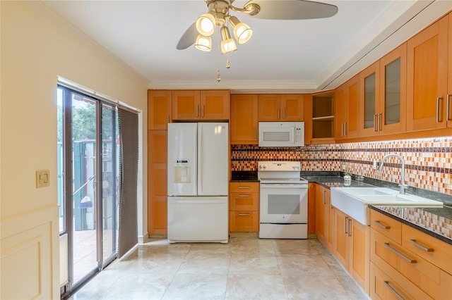 kitchen featuring light tile patterned flooring, white appliances, backsplash, ceiling fan, and sink