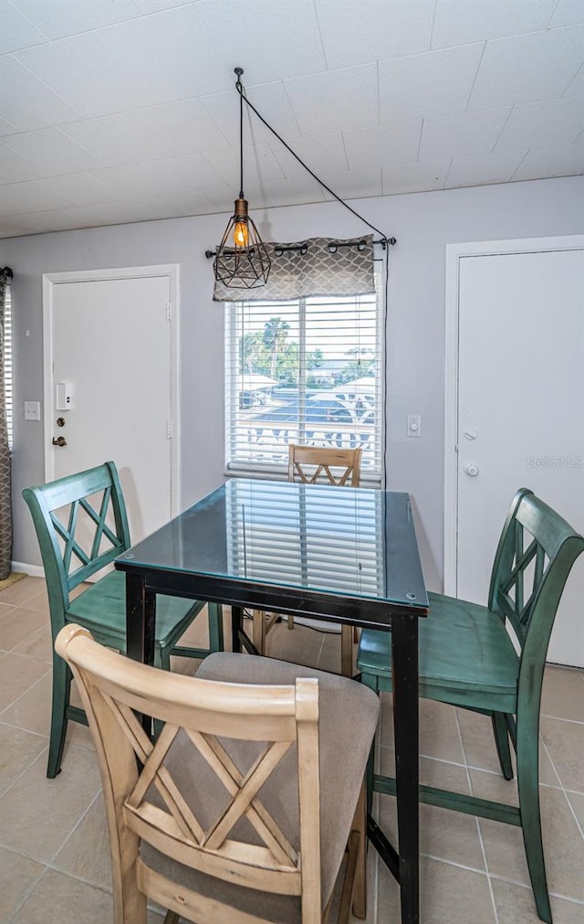 view of tiled dining space