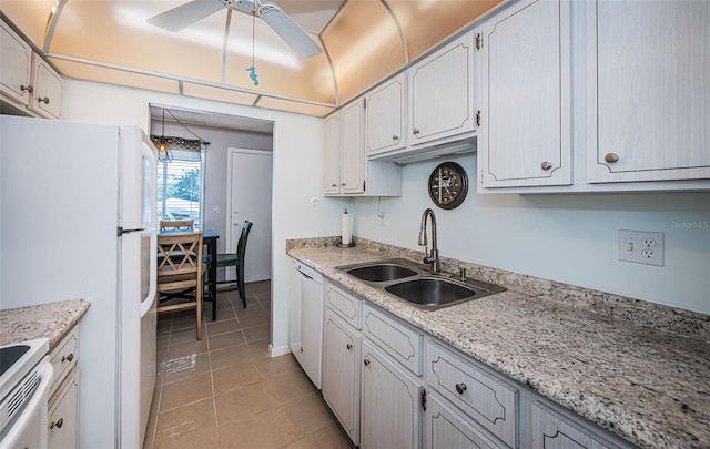 kitchen with sink, white cabinets, light tile patterned floors, ceiling fan, and white appliances