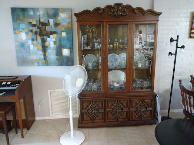 interior space featuring light tile patterned floors