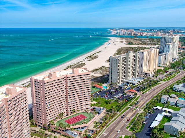 bird's eye view featuring a view of the beach and a water view