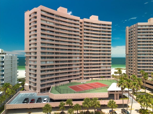 view of building exterior with a water view