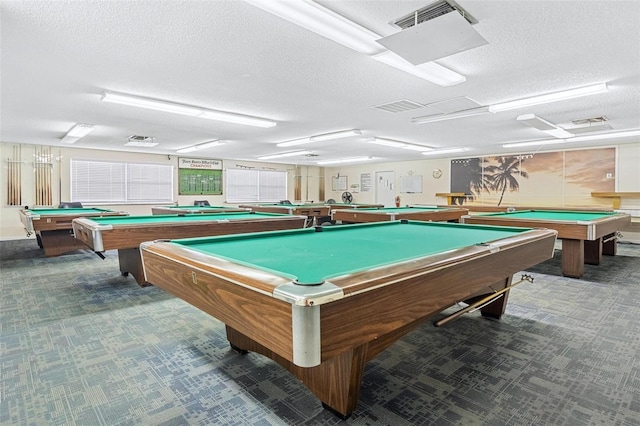 3128 59th St S Unit 214, Gulfport, FL 33707 - playroom featuring billiards, a textured ceiling, and carpet