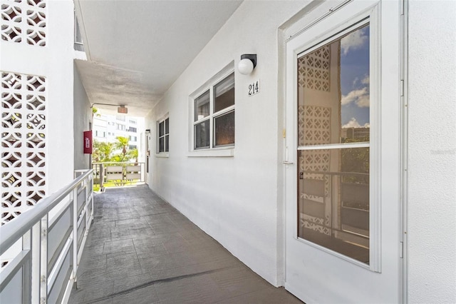 3128 59th St S Unit 214, Gulfport, FL 33707 - doorway to property featuring a balcony