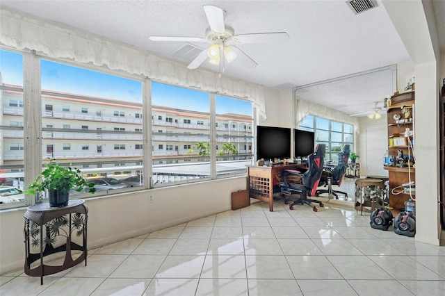 3128 59th St S Unit 214, Gulfport, FL 33707 - office space featuring a ceiling fan, a textured ceiling, and tile patterned floors