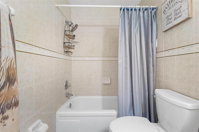 3128 59th St S Unit 214, Gulfport, FL 33707 - bathroom featuring tile walls, toilet, and shower / tub combo with curtain