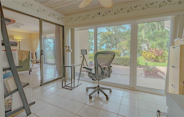 doorway to outside featuring light tile patterned flooring