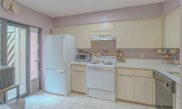 kitchen with dishwasher, stove, cream cabinets, light tile patterned floors, and white fridge