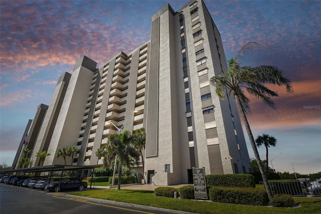 view of outdoor building at dusk