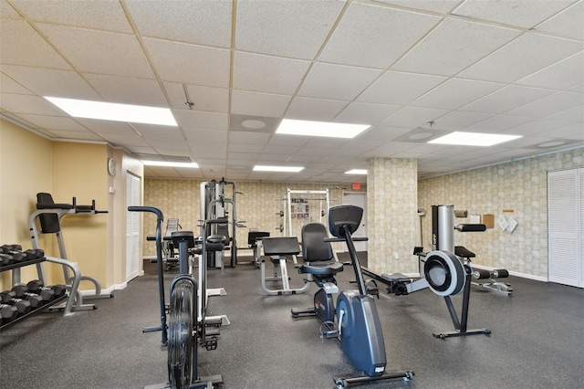 workout area with a drop ceiling