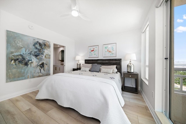 bedroom featuring ceiling fan and light wood-type flooring