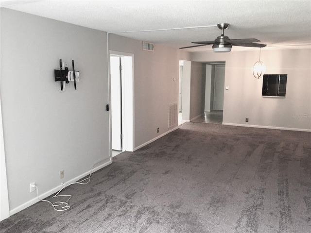 333 Lake Howard Dr NW Unit 204C, Winter Haven, FL 33880 - unfurnished living room featuring ceiling fan, carpet floors, and baseboards