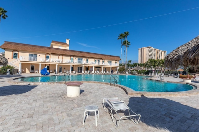 view of swimming pool featuring a patio