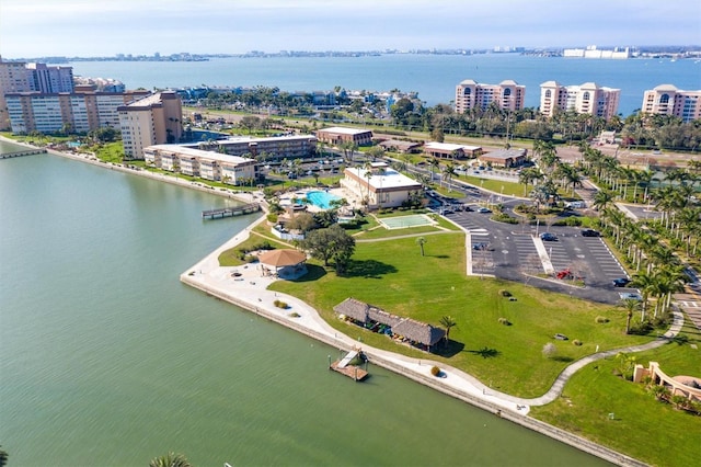 birds eye view of property with a water view