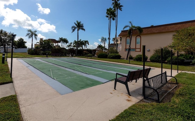 surrounding community with a yard