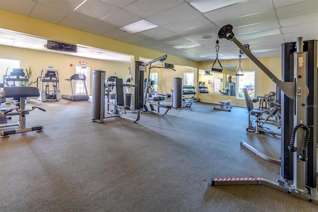exercise room featuring a drop ceiling