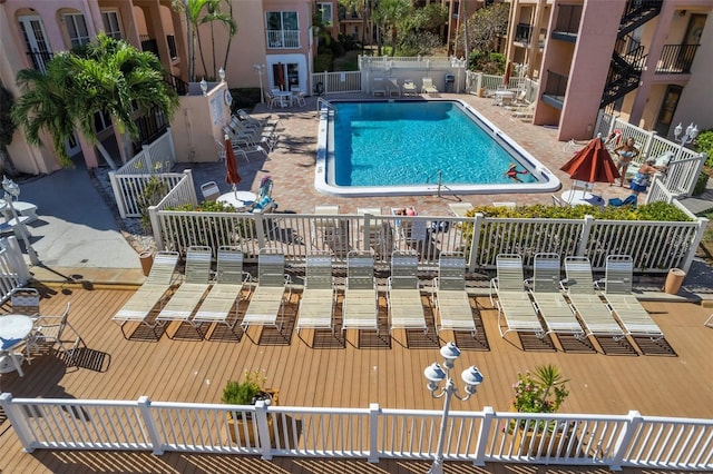 view of swimming pool featuring a patio