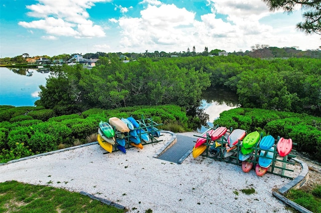 view of playground with a water view